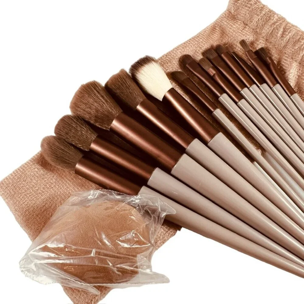 Complete makeup brush set with travel pouch and beauty blender NWT
